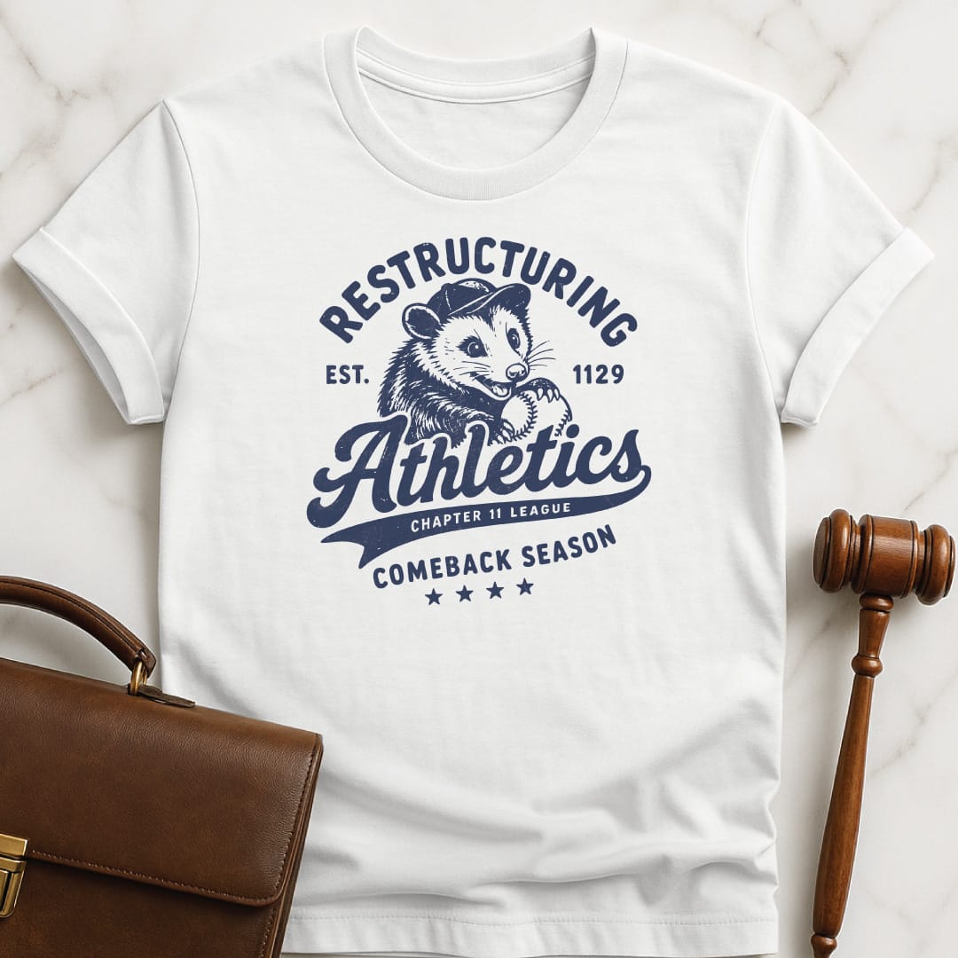 cool lawyer graphic t shirt that says Restructuring Athletics est 1129 comeback season chapter 11 league featuring possum with a baseball hat and baseball in white