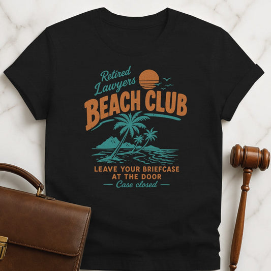 funny lawyer graphic t-shirt that says retired lawyers beach club case closed leave featuring beach scene in black