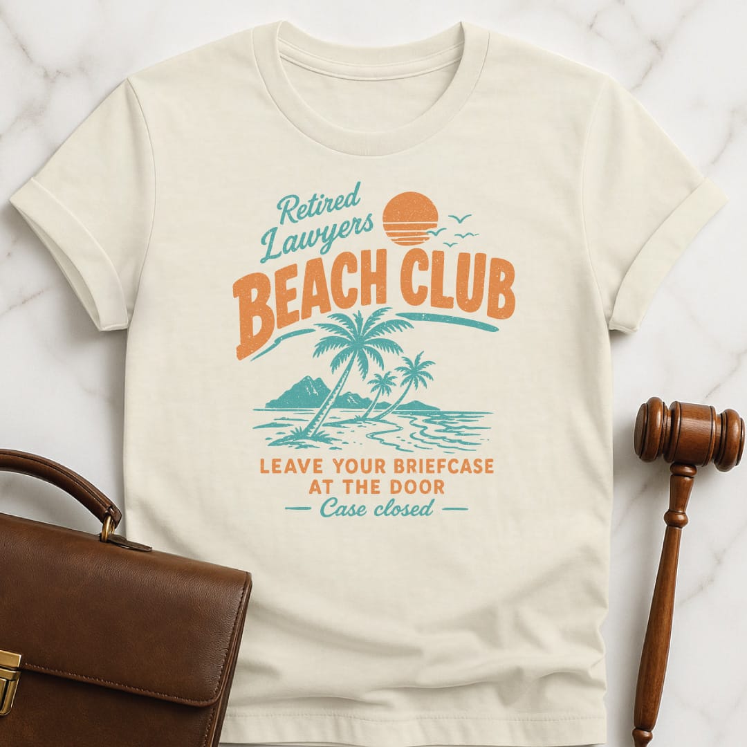 cool attorney graphic tee that says retired lawyers beach club case closed leave featuring beach scene in cream