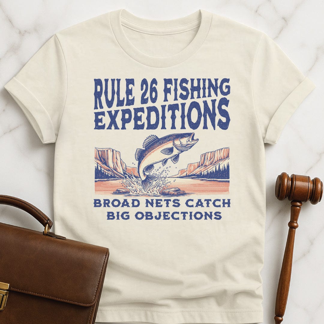 funny law school graduate graphic tee that says Rule 26 Fishing Expeditions Broad Nets Catch Broad Objections featuring fish jumping out of the water in cream