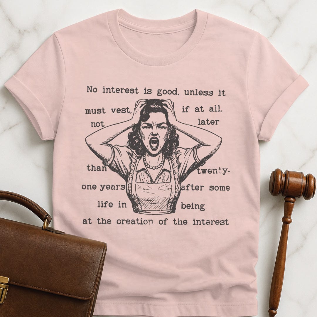 cool law school graphic tee that says rule against perpetuities No interest is good featuring a woman panicking in pink