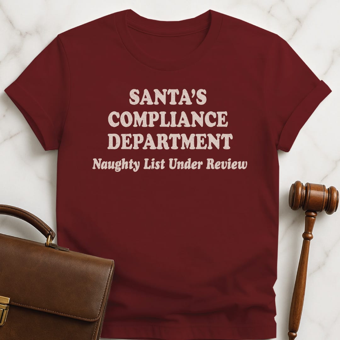 holiday new lawyer graphic t shirt that says Santas Compliance Department Naughty List Under Review in red