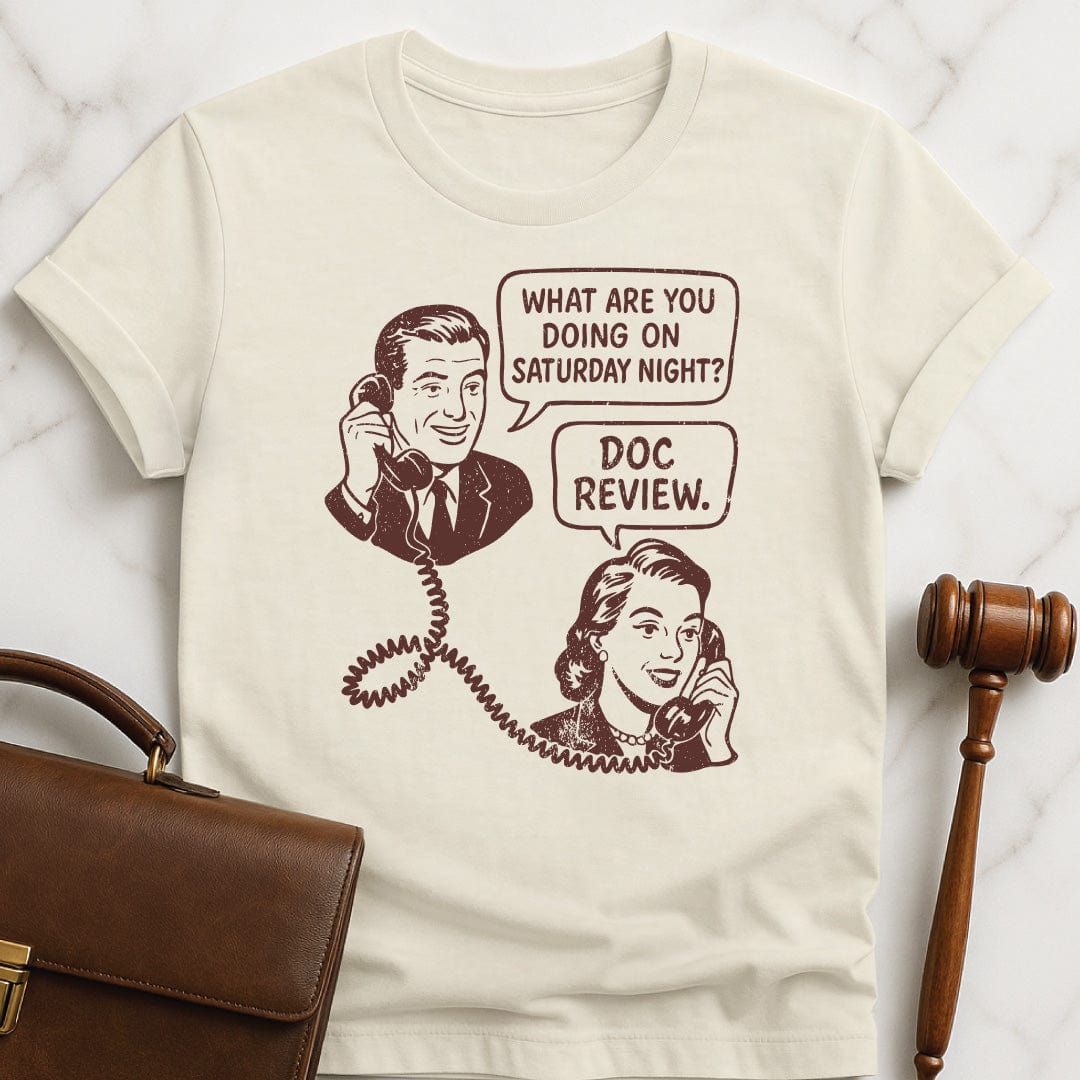funny attorney graphic t-shirt featuring man asking a woman on the phone what are you doing Saturday night and she says doc review in cream