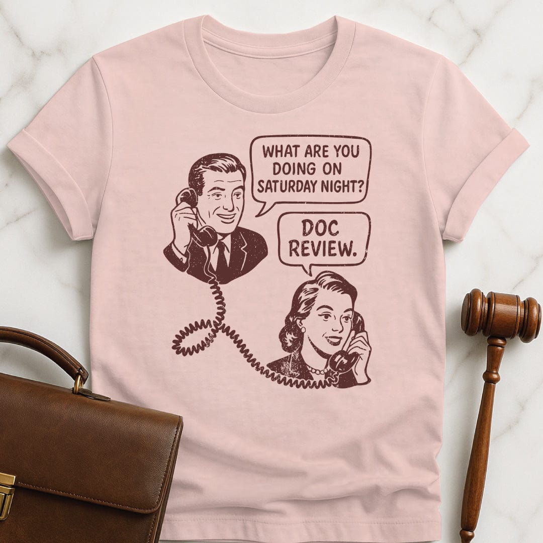 funny attorney graphic t-shirt featuring man asking a woman on the phone what are you doing Saturday night and she says doc review in pink