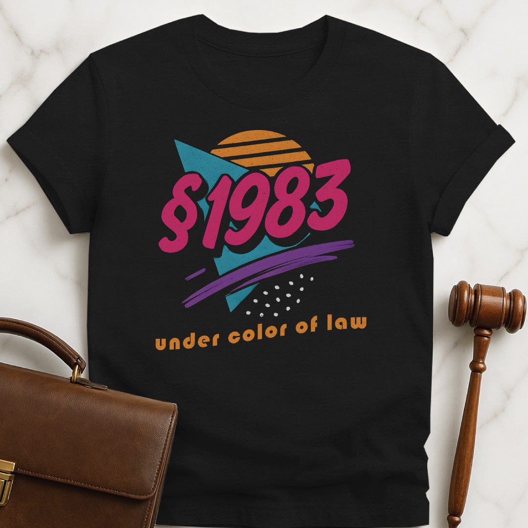 cool law school graduate graphic tee that says section 1983 under color of law featuring 80s style font and graphics in black