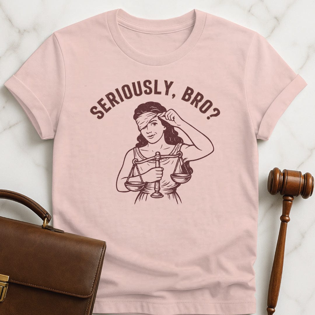 trendy attorney graphic tshirt that says Seriously bro featuring Lady justice smirking in pink