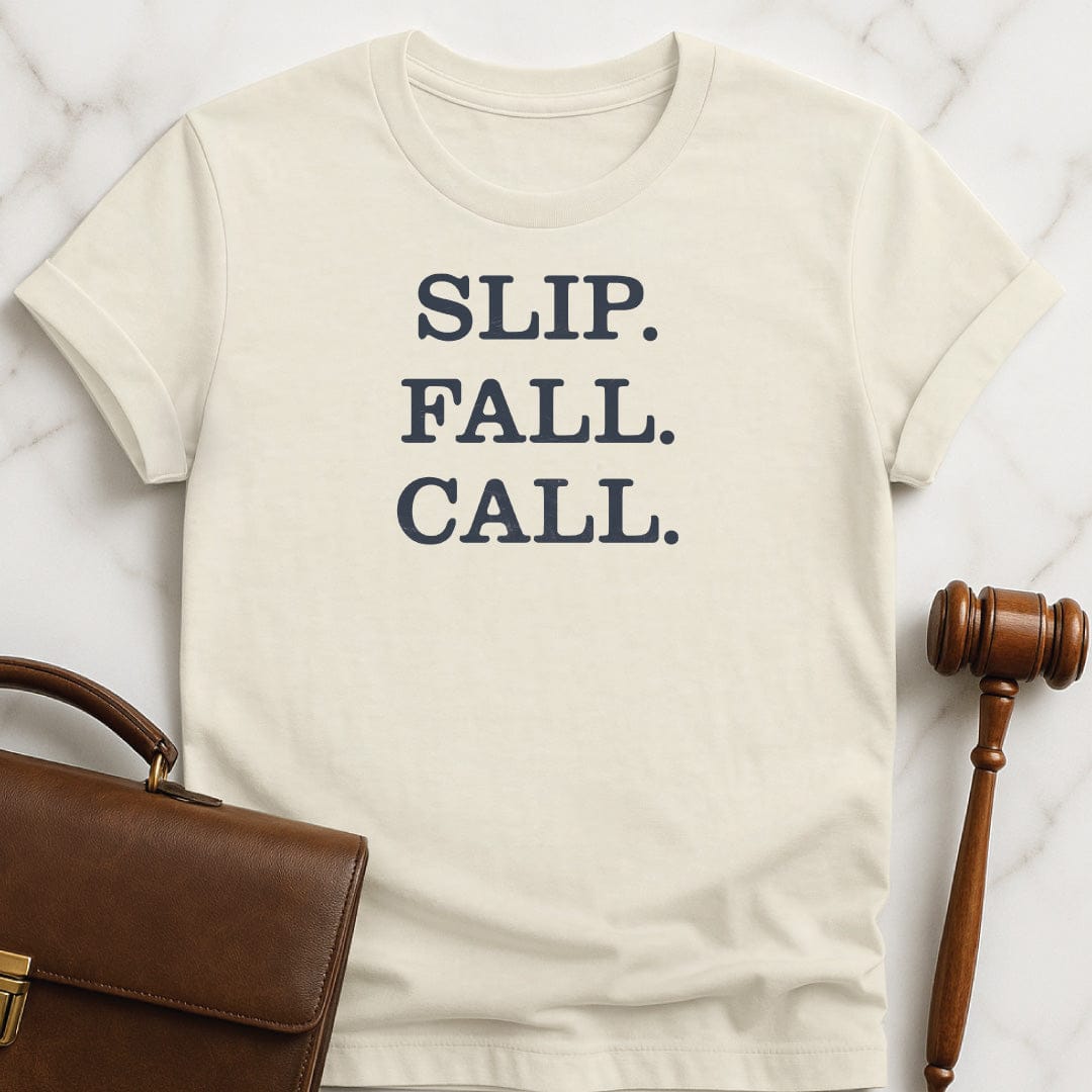 funny law graduate graphic tshirt that says slip fall call in cream