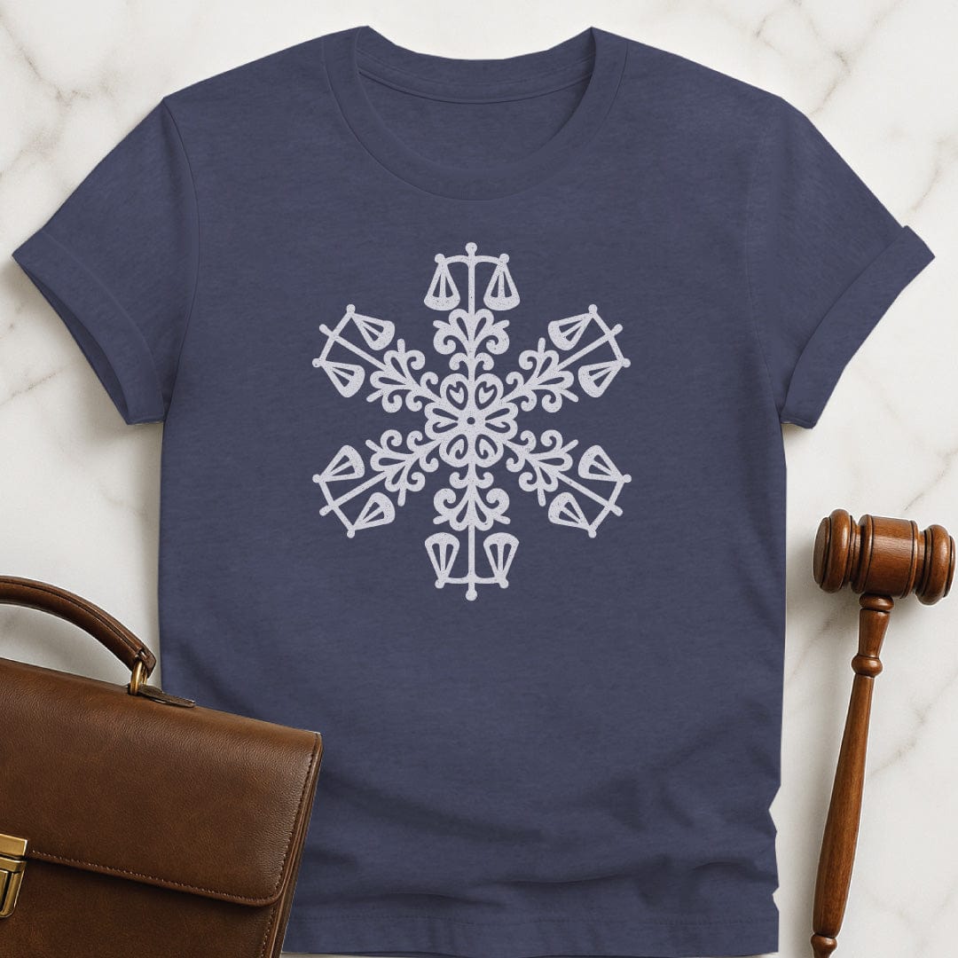 christmas new attorney graphic tshirt featuring snowflake made up of little scales of justice in heather blue