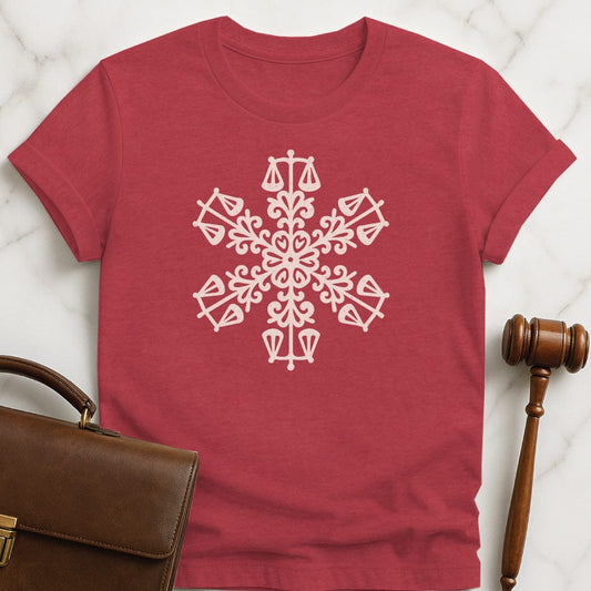 christmas law graduate t-shirt featuring snowflake made up of little scales of justice in heather red