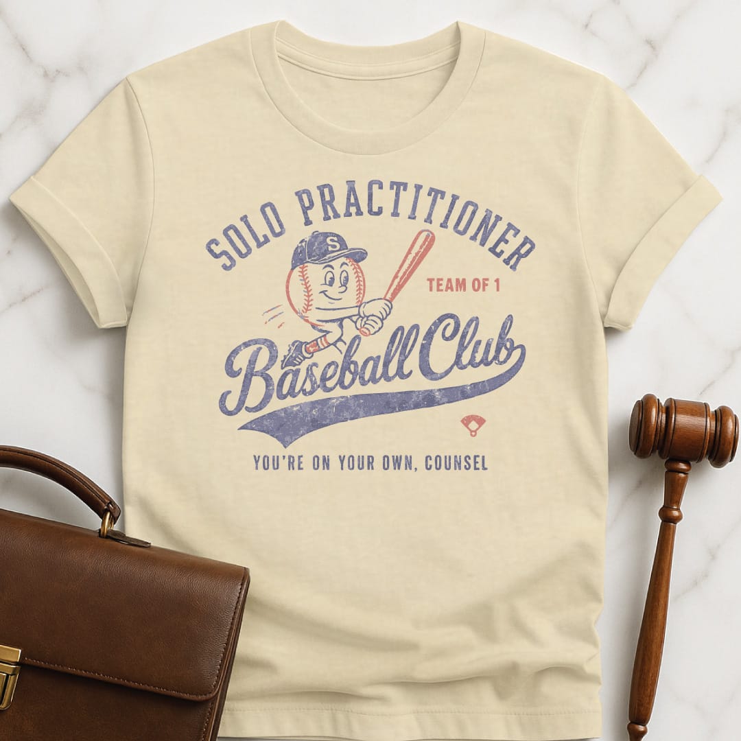 cool law graduate tee that says Solo Practitioner Baseball Club Youre On Your featuring cute baseball holding a bat in cream