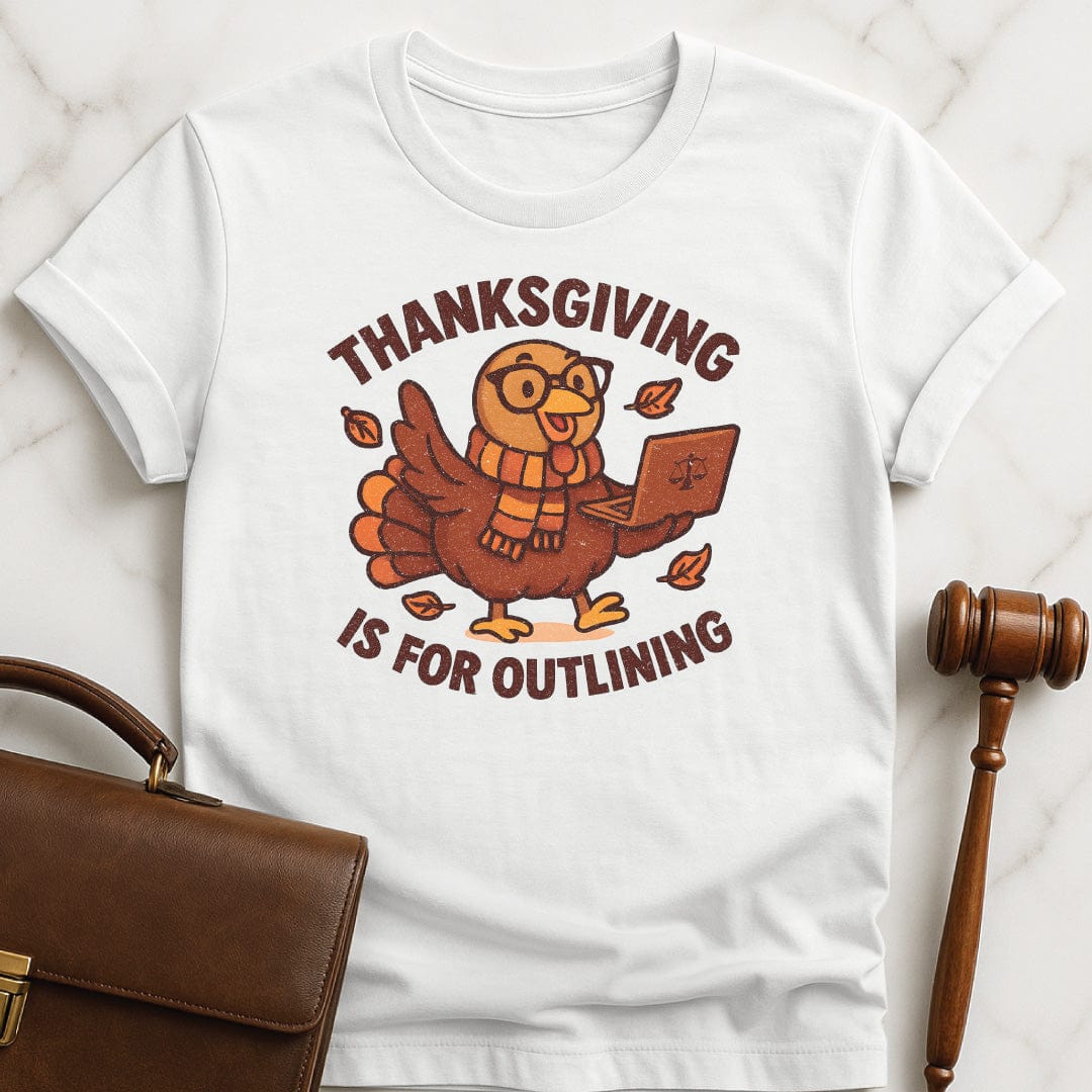 funny law student graphic tshirt that says thanksgiving is for outlining featuring a turkey in a scarf and glasses holding a laptop in white