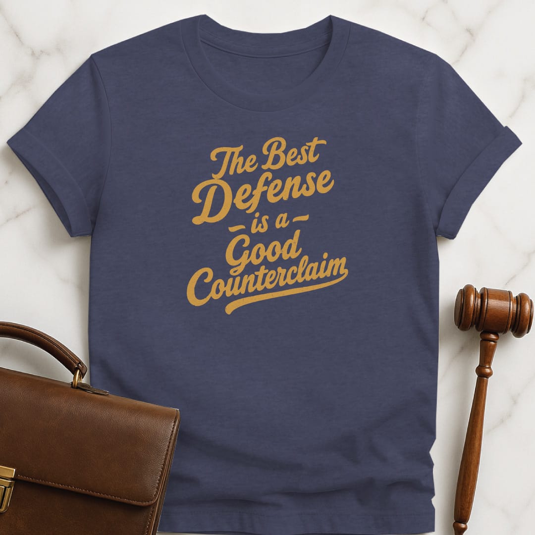funny new lawyer graphic tshirt that says The Best Defense is a good counterclaim in heather blue