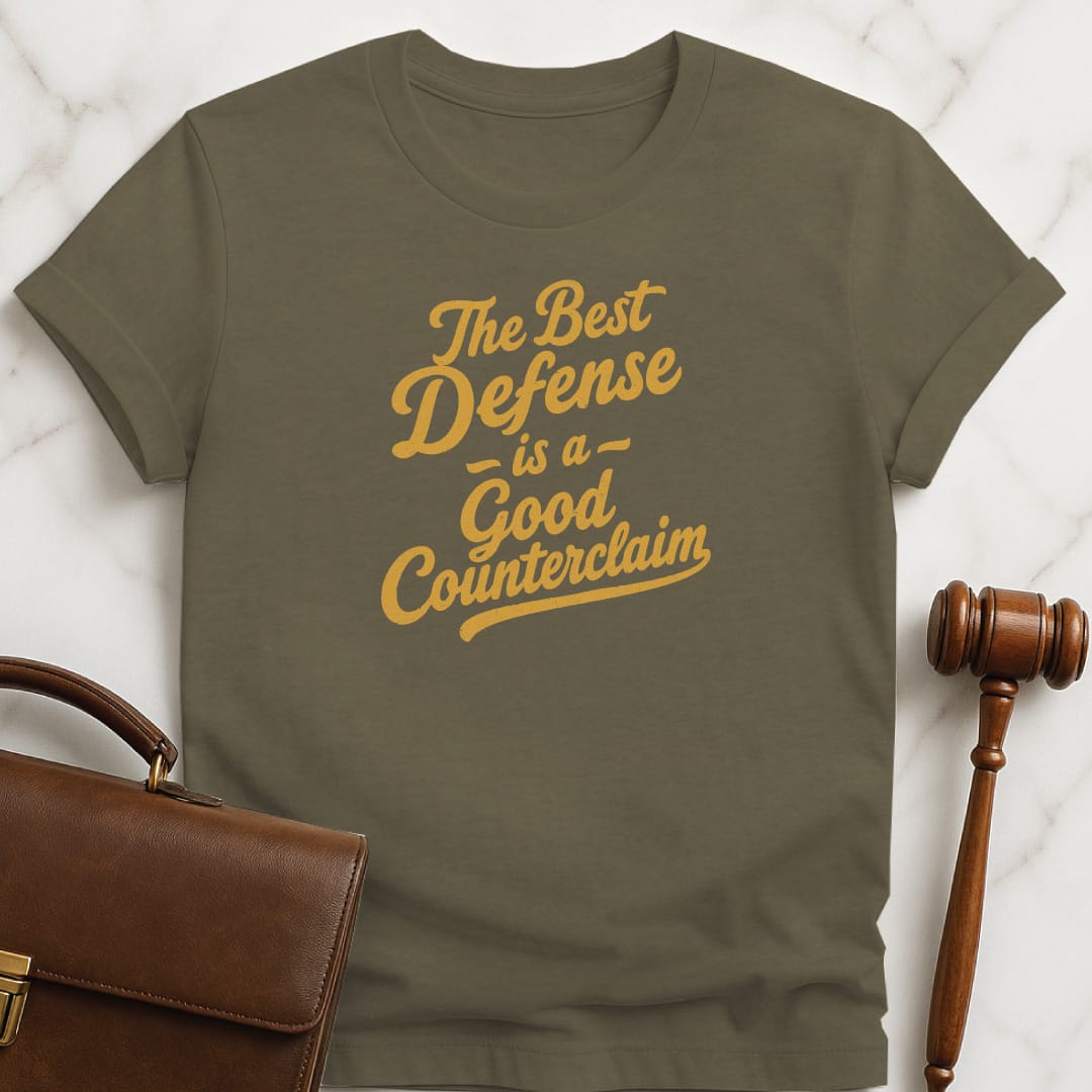 cool attorney t shirt that says The Best Defense is a good counterclaim in heather green