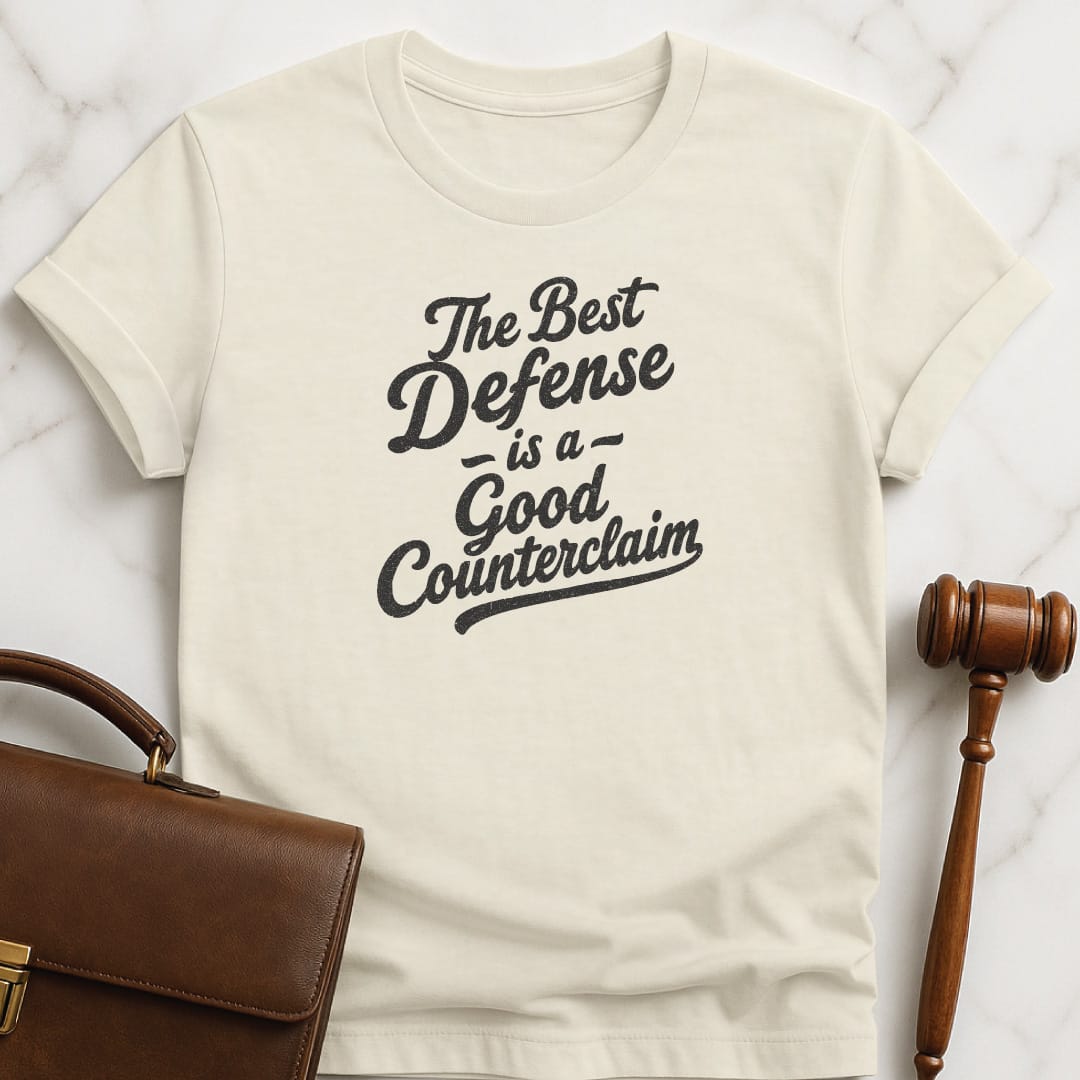 cool new attorney graphic tee that says The Best Defense is a good counterclaim in cream