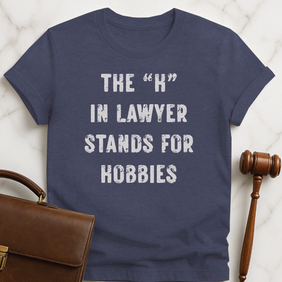 clever lawyer graphic tee that says The H in Lawyer Stands for Hobbies in heather blue