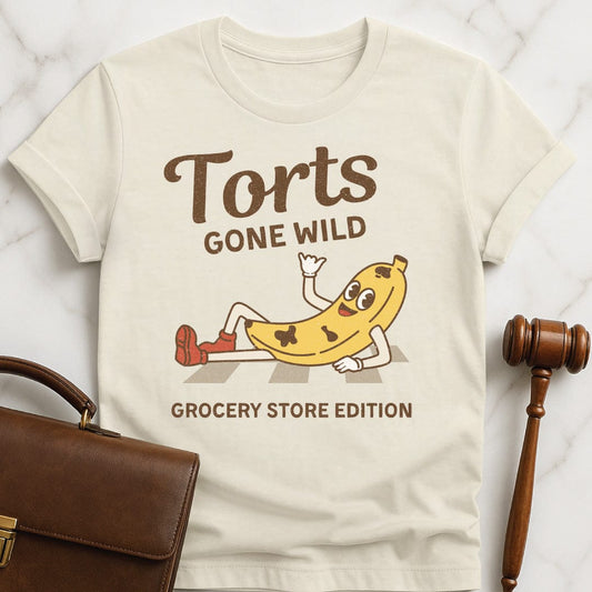lawyer graphic tshirt that says Torts Gone Wild Grocery Store Edition in cream