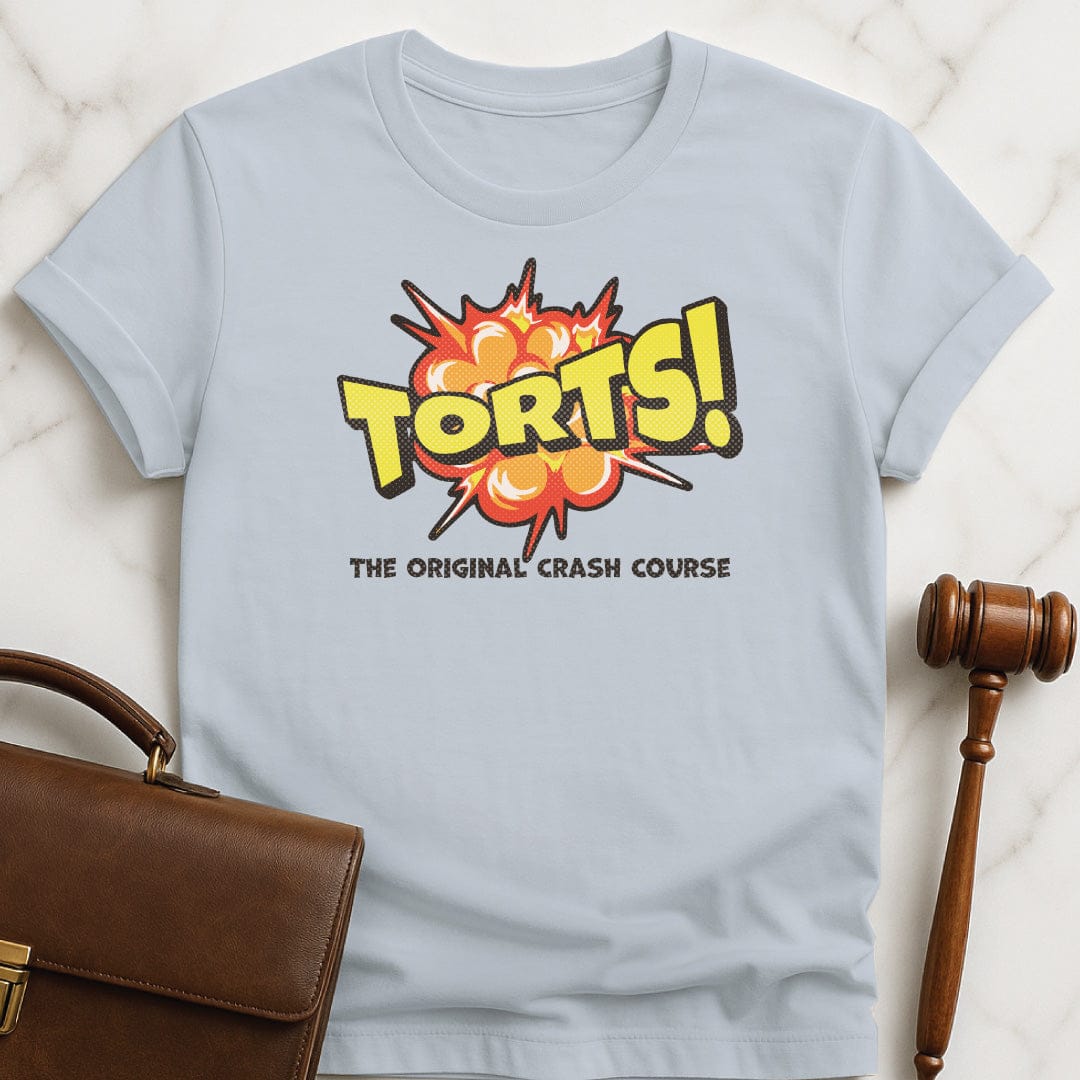 cool new attorney graphic tee that says Torts the original crash course featuring comic book style explosion in blue