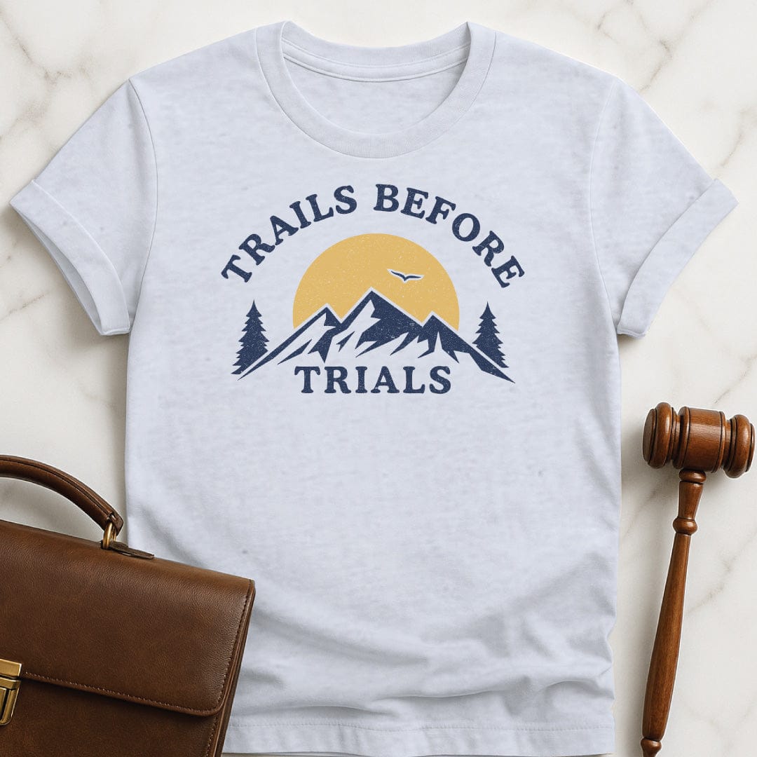 cool new attorney tshirt that says trails before trials featuring mountain sun and a flying bird in grey