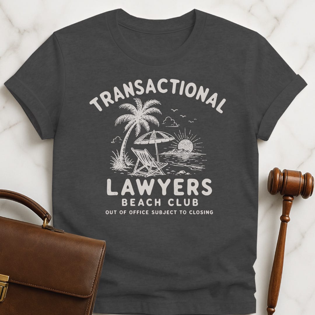 funny attorney graphic tshirt that says transactional lawyers beach club out of office subject to closing featuring beach scene in grey