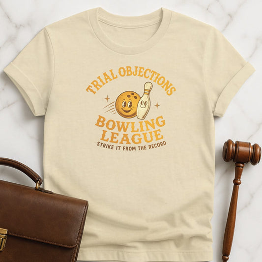 cool lawyer graphic t shirt that says Trial Objections Bowling League Strike it from the record featuring bowling pin and bowling ball in cream