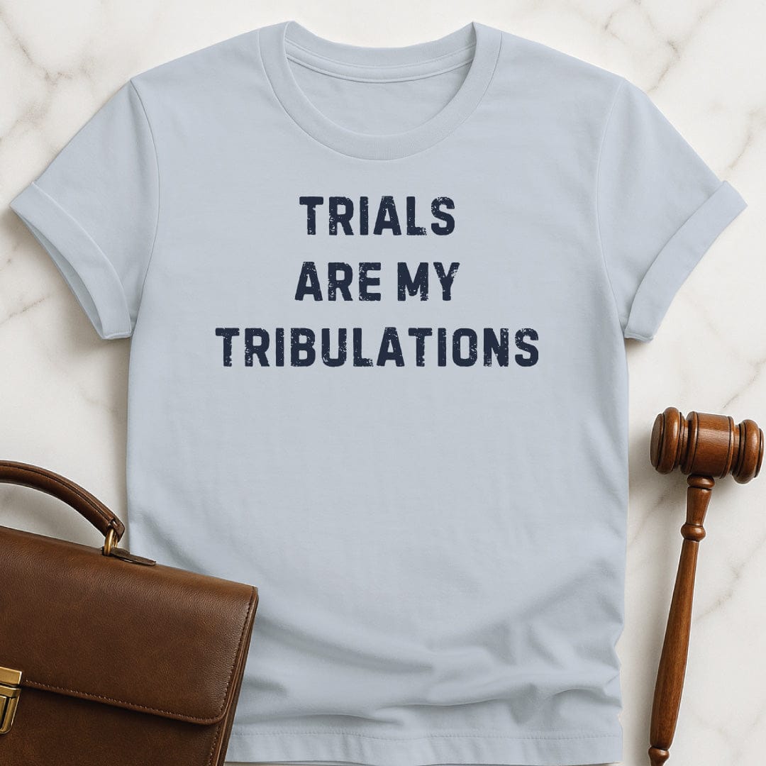 funny law school grad graphic tshirt that says trials are my tribulations in blue