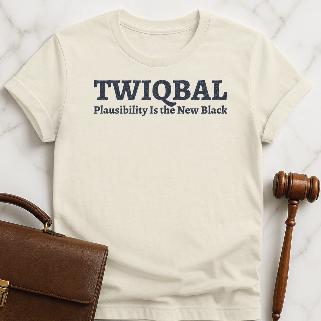 cool new attorney t-shirt that says Twiqbal plausibility is the new black in cream