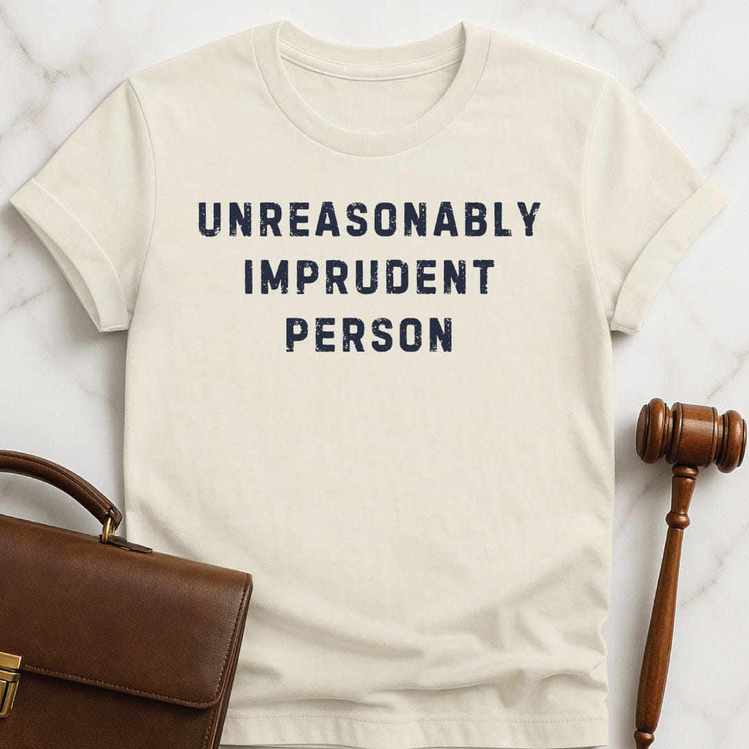 funny attorney tshirt that says unreasonably imprudent person in cream