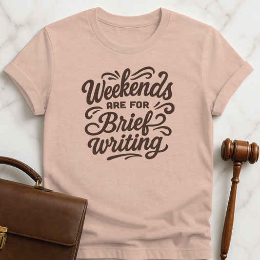 cute attorney graphic t-shirt that says Weekends are for brief writing in heather peach