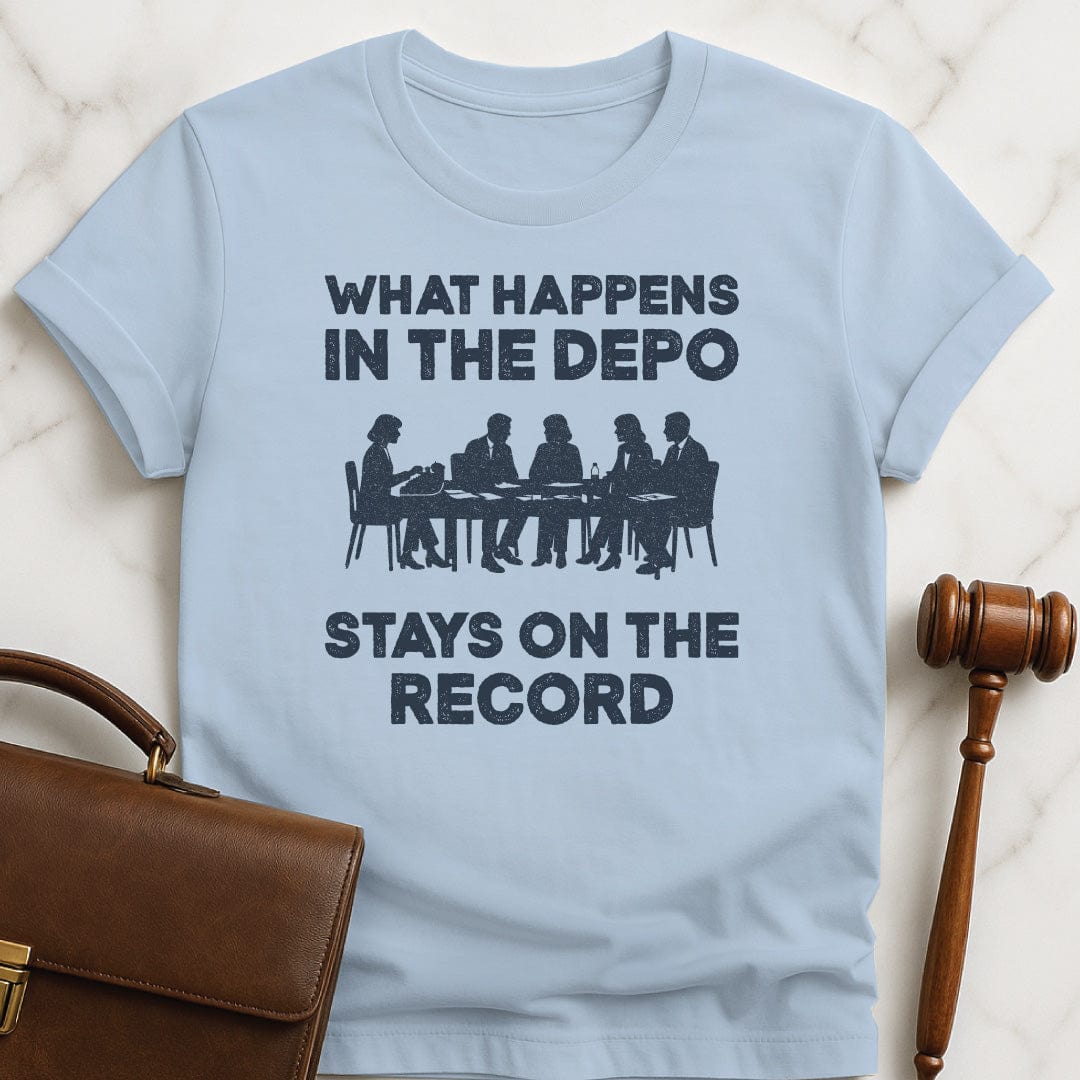 cool new lawyer tee that says What happens in the depo stays on the record featuring silhouette of people at a conference table during a deposition in blue
