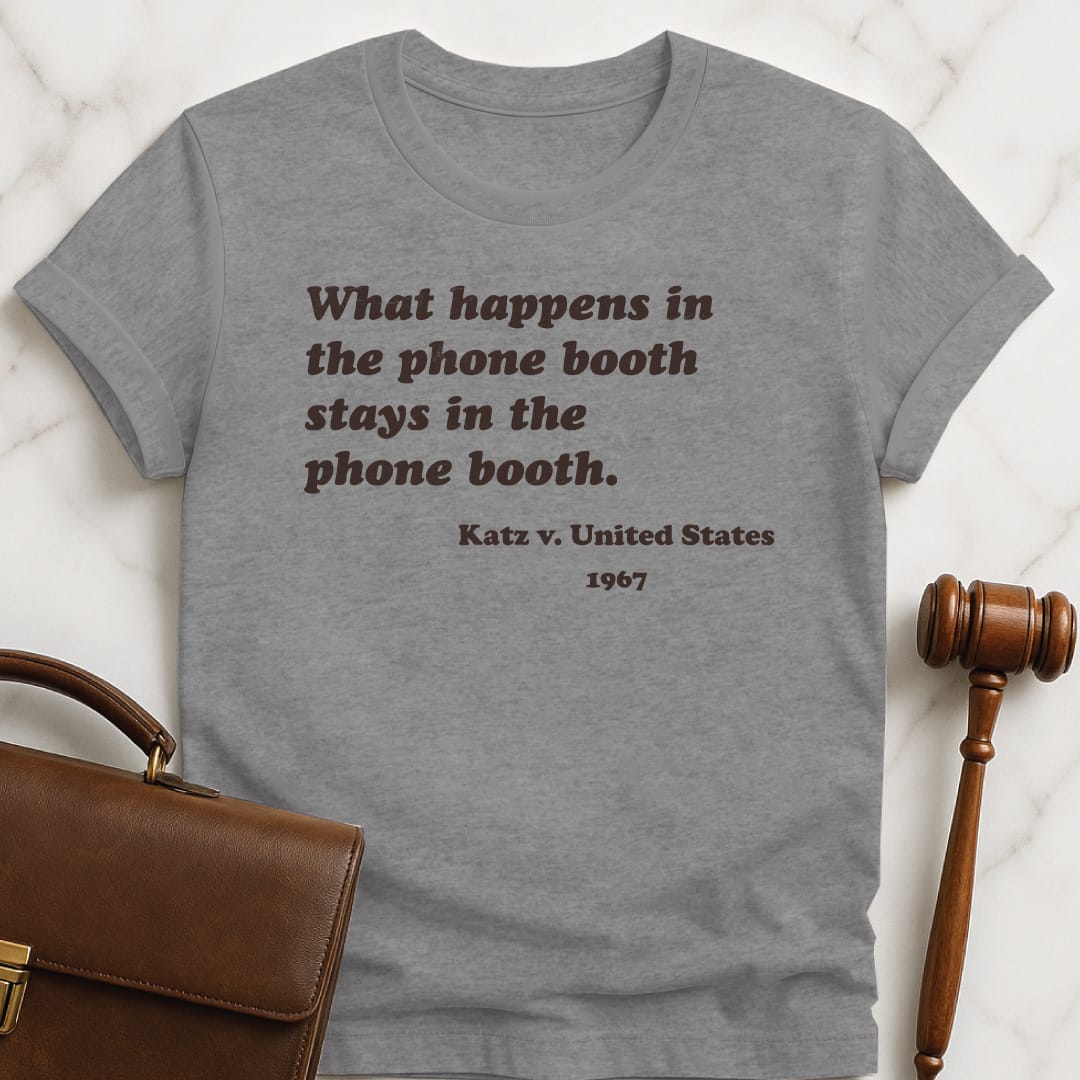 cool law grad graphic t shirt that says What happens in the phone booth stays in grey