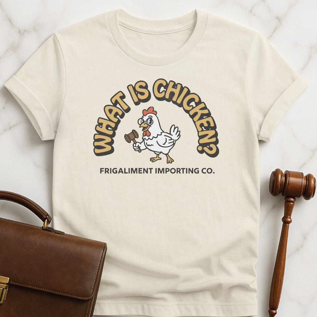 funny law student graphic t-shirt that says What Is Chicken Frigaliment Importing Co featuring retro chicken with glasses and a gavel in cream