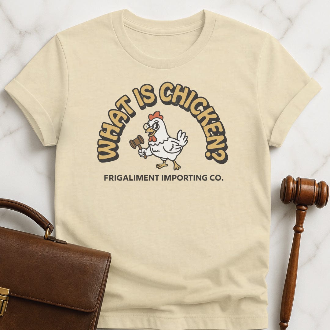funny law student tshirt that says What Is Chicken Frigaliment Importing Co featuring retro chicken with glasses and a gavel in cream