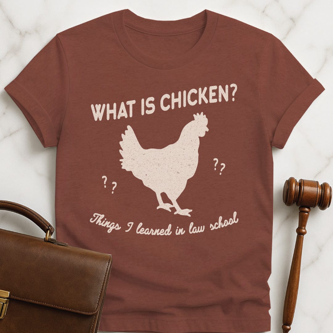 funny law student graphic t-shirt that says what is chicken Things I learned in law school featuring a silhouette of a chicken in heather brown