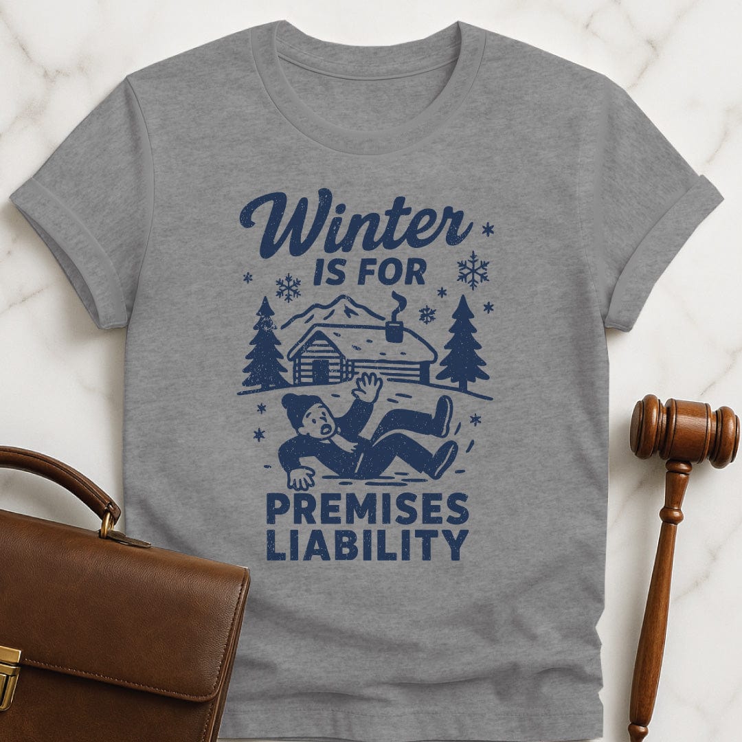 funny new attorney t-shirt that says Winter is for premises liability featuring man falling on snow in grey