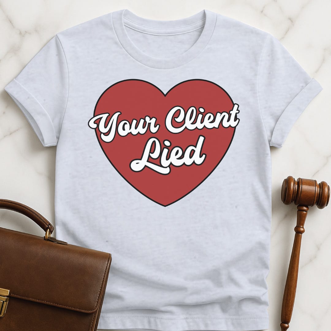 cool law grad graphic tshirt that says Your client lied featuring heart in grey